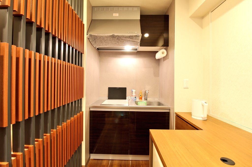 キッチン付きのスイートルーム